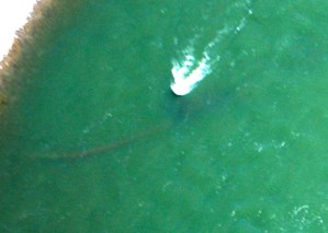 Broken Silvertip Pipeline sticks above water. Photo: Mike Trombetta, DEQ.