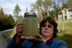 Carol French of Pennsylvania with frack water