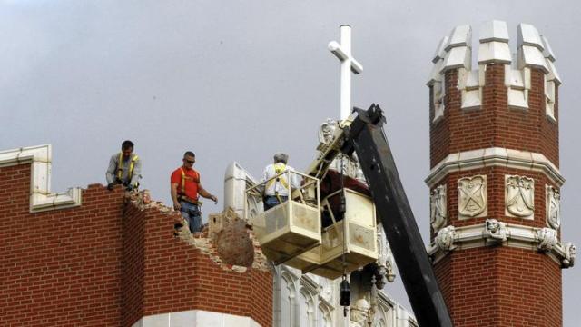 Inspecting the damage from an induced earthquake in Shawnee, Oklahoma. Photo: Associated Press