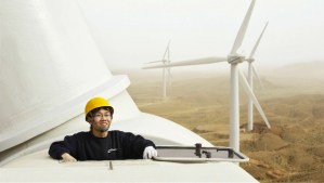 Chinese worker installing a wind turbine. China will spend $27 billion in renewable energy projects this year alone. Source: Efergy