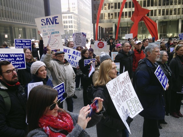 EPA employees and environmental activists gather in Chicago, Monday, Feb. 6, 2017, to protest the nomination of Scott Pruitt for administrator of the agency. (AP Photo/Carla K. Johnson)